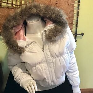 White Snow Jacket with fur lining.